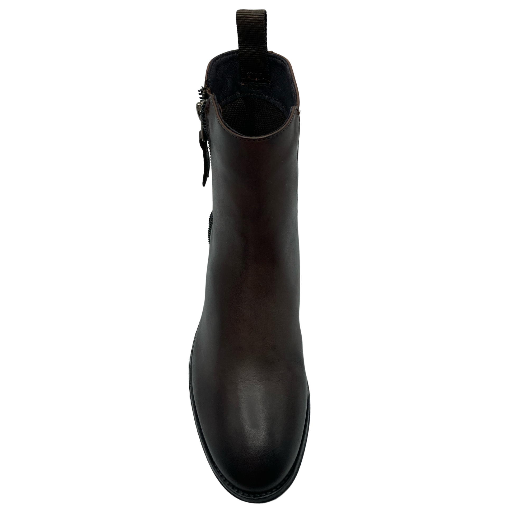 Top view of brown leather boot with zipper closure and pull on heel tab