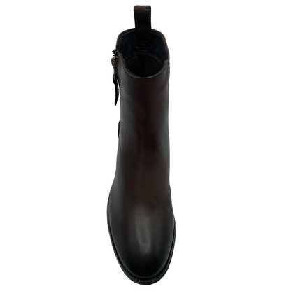 Top view of brown leather boot with zipper closure and pull on heel tab