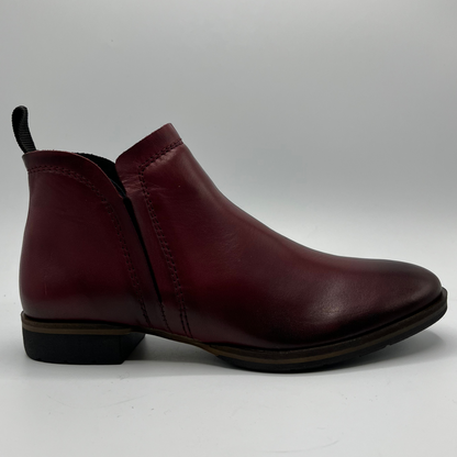 Maroon leather ankle boot on a white background