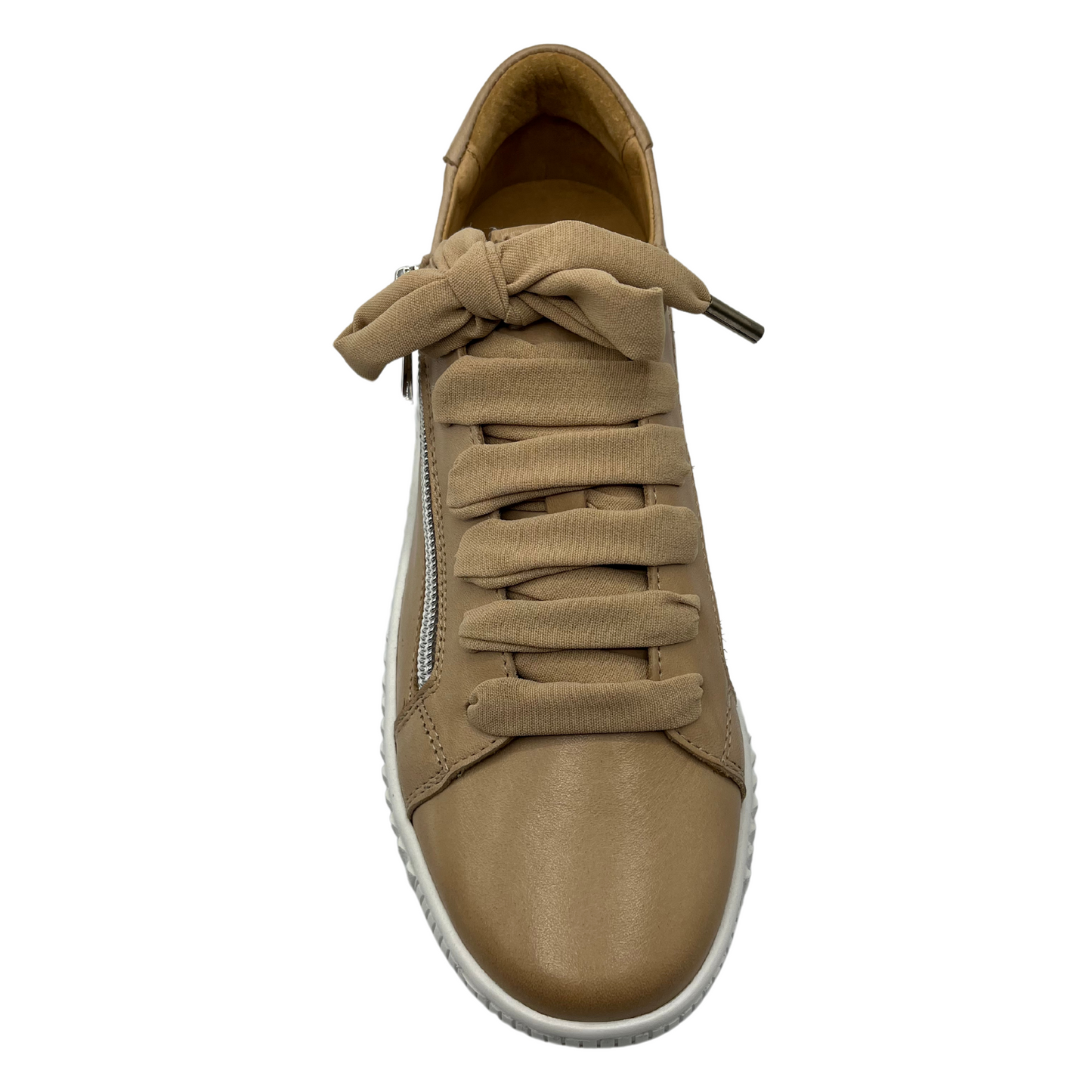 Top view of nude leather sneaker with matching laces and white rubber outsole