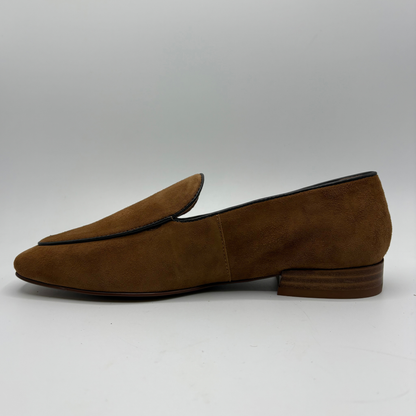 Left facing view of a brown leather loafer with a short stacked heel on a white background