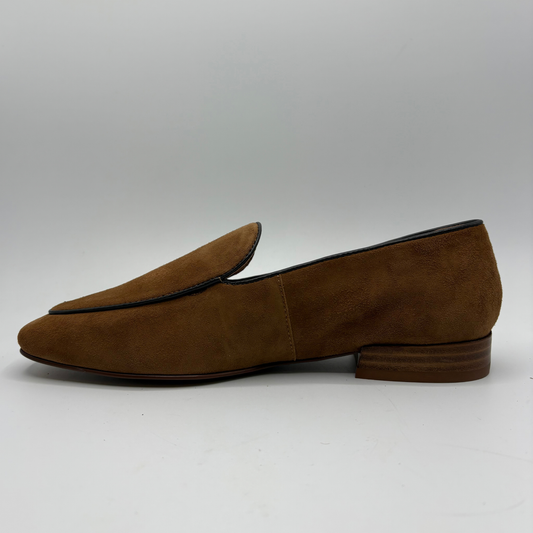 Left facing view of a brown leather loafer with a short stacked heel on a white background