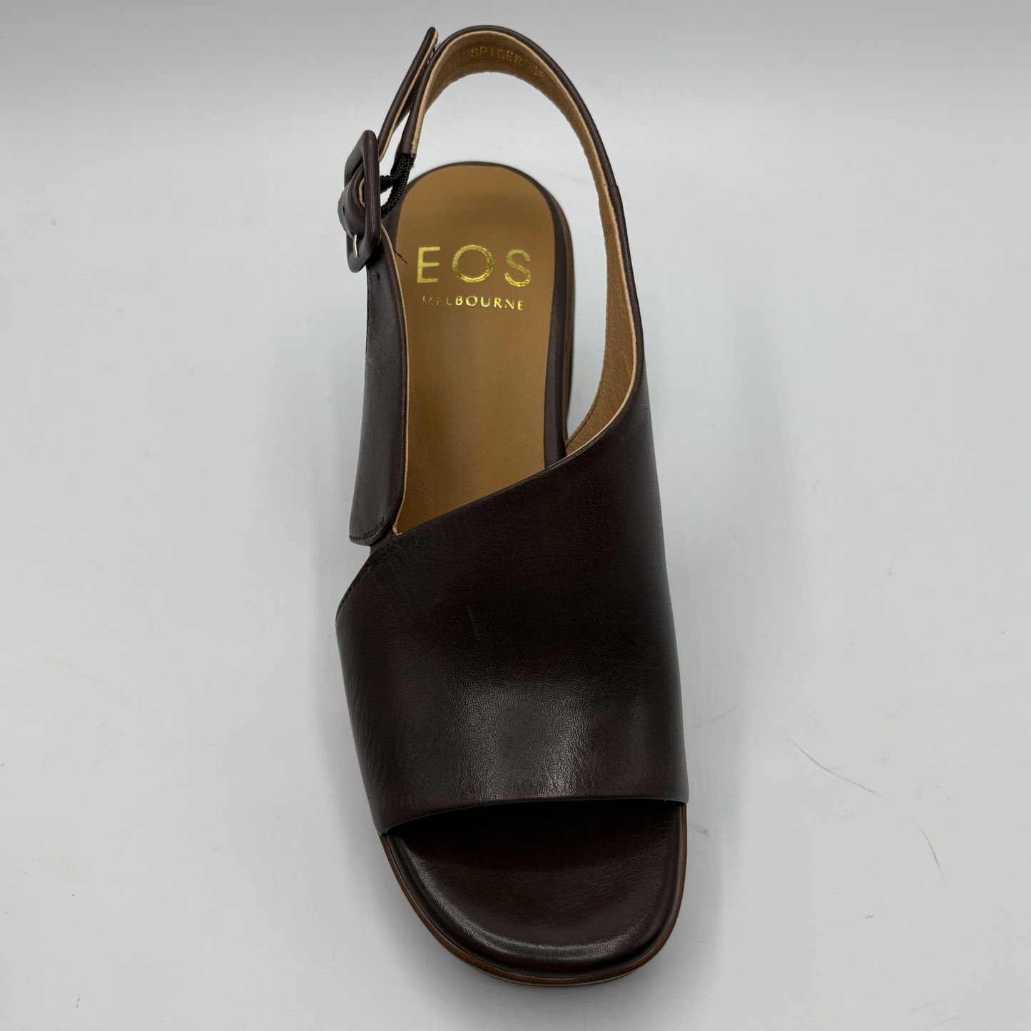 Brown sandal with 'EOS' branding on a light gray background