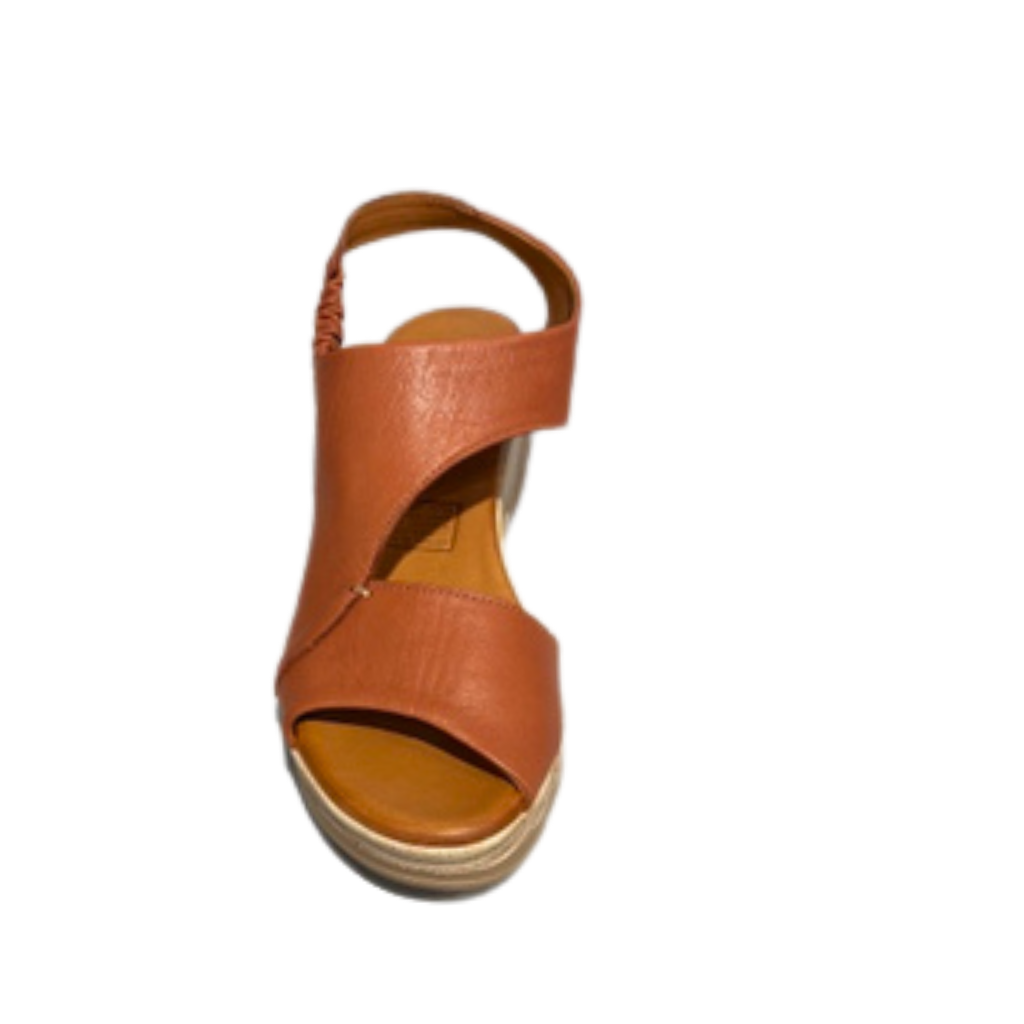 Mahogany leather sandal on a white background