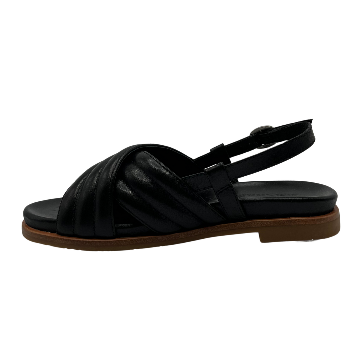 Left facing view of black leather sandal with padded cross over straps and sling back buckle strap