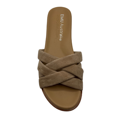 Top view of taupe suede slip on sandal with padded upper and footbed. Cross strap design and low heel.