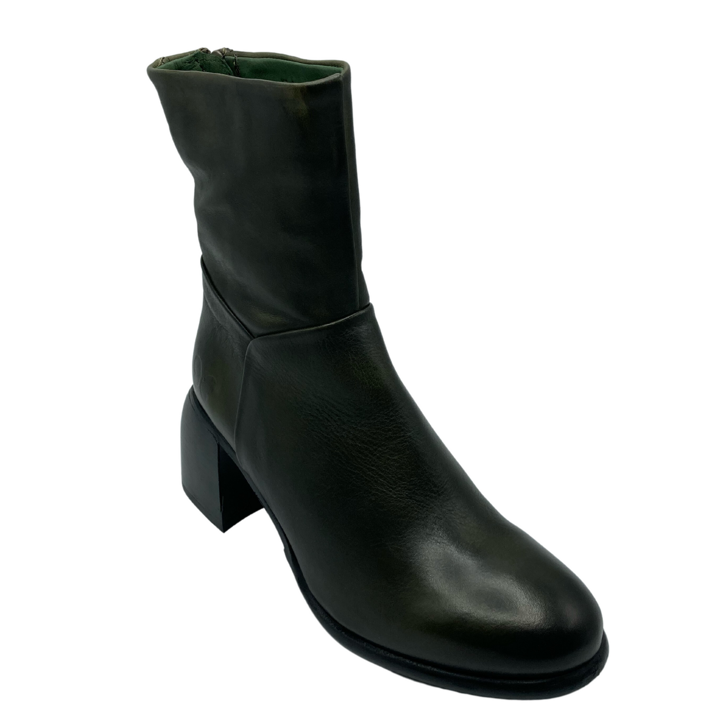 45 degree angled view of green leather short boot with rounded toe. Black sole, block heel and textile lining.