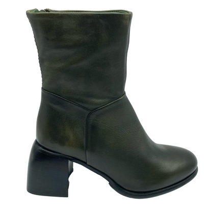 Right facing view of green leather short boot with black, block heel and rounded toe.
