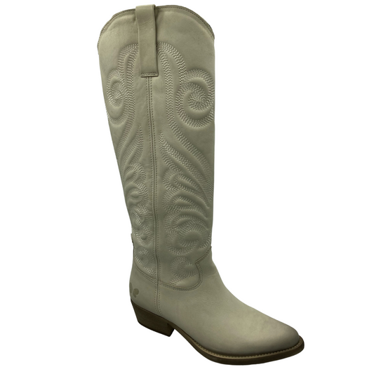45 degree angled view of tall off-white leather cowboy boot with beige sole