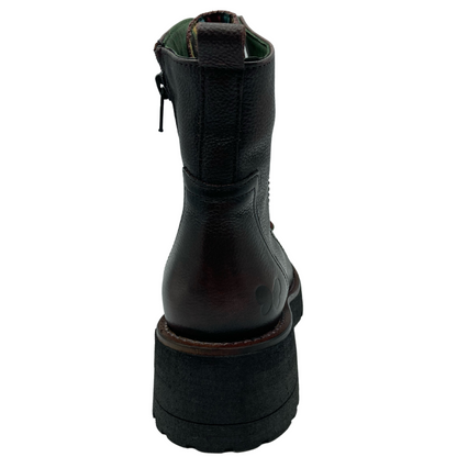Hind view of calf-height leather boot with pull tab and chunky heel