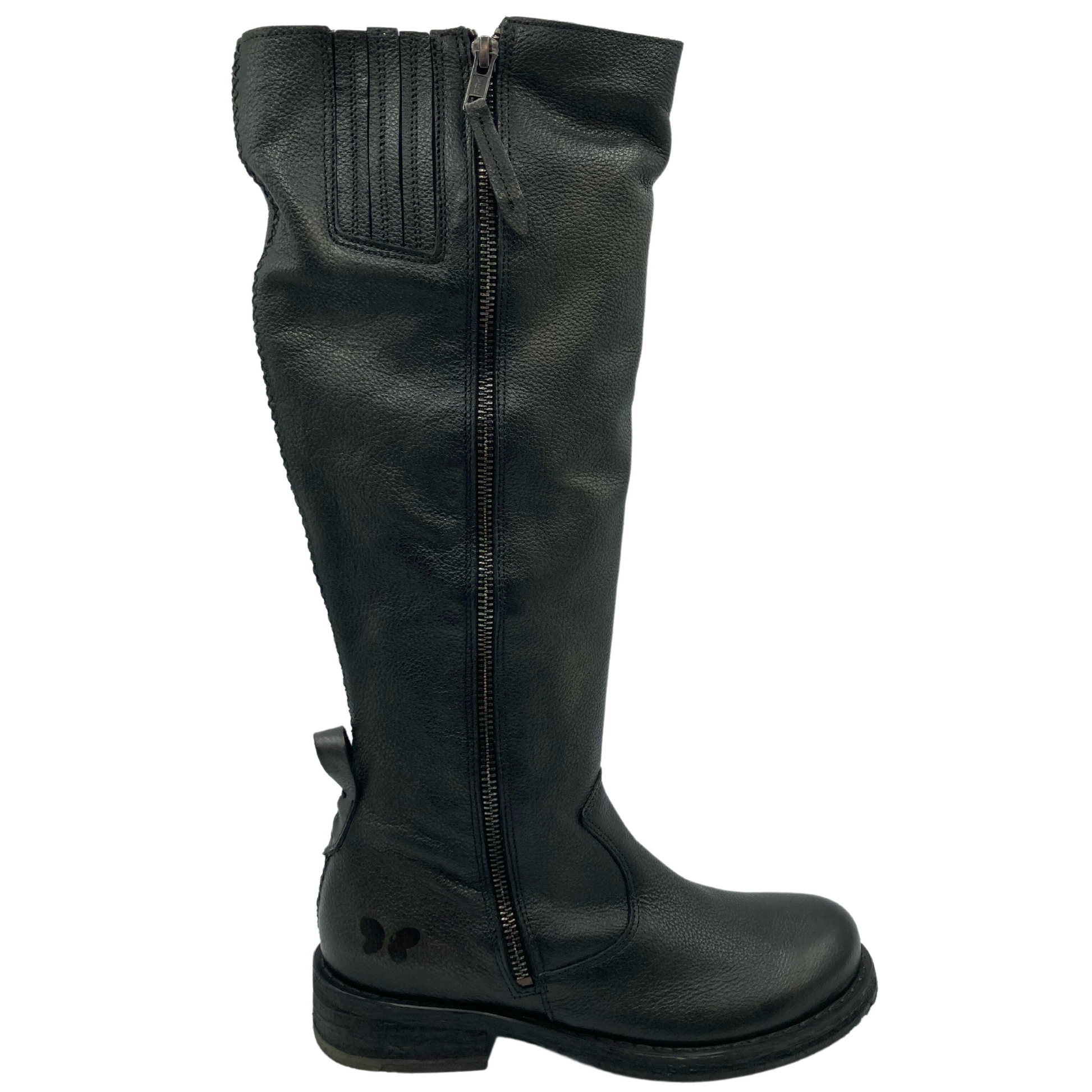 Right facing view of tall, leather boot with 1.25 inch heel and zipper closure