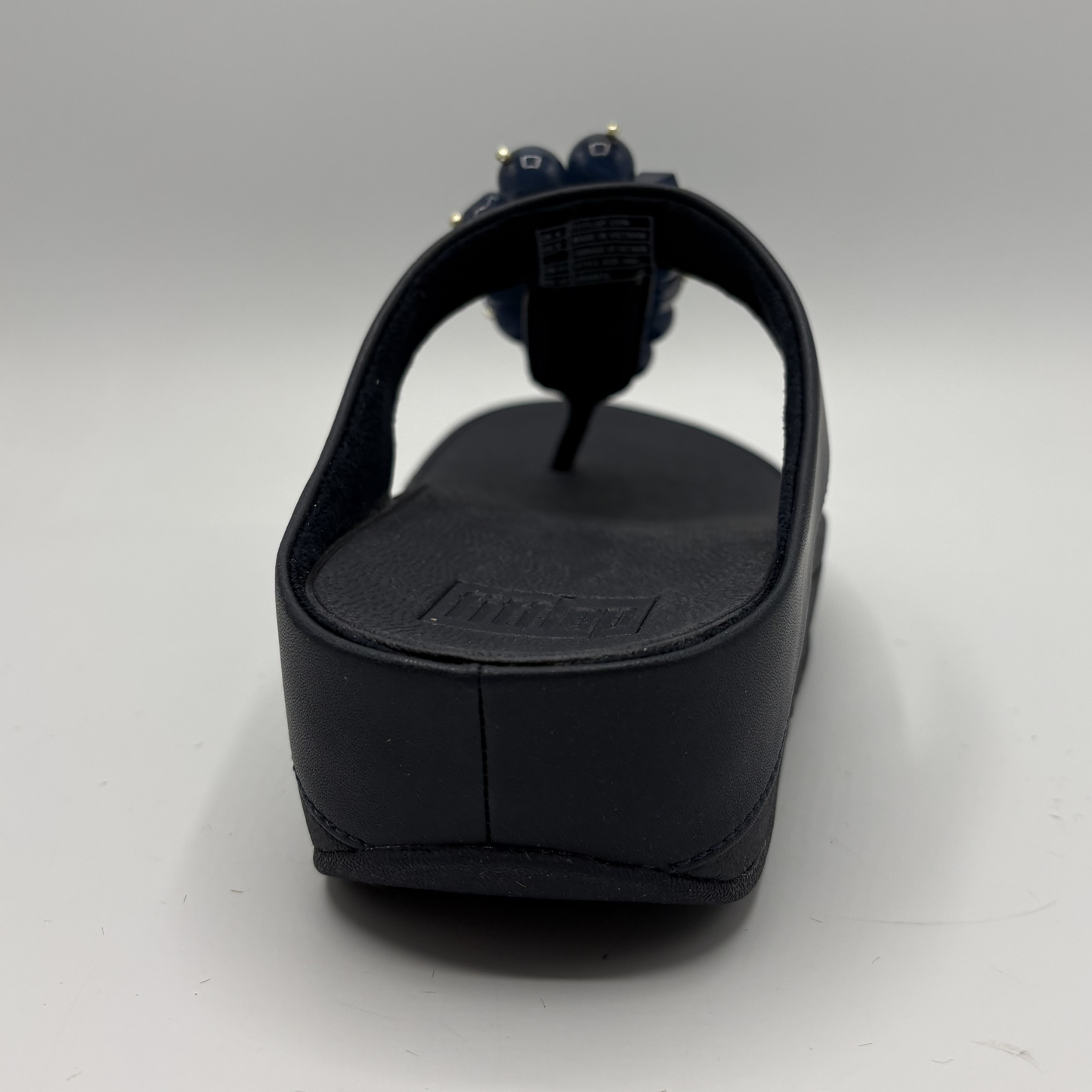Navy sandal on a white background