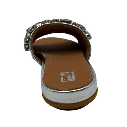 Back view of silver slip on sandal with jewel embellishments and open toe