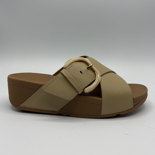 Brown sandal with a buckle on a white background