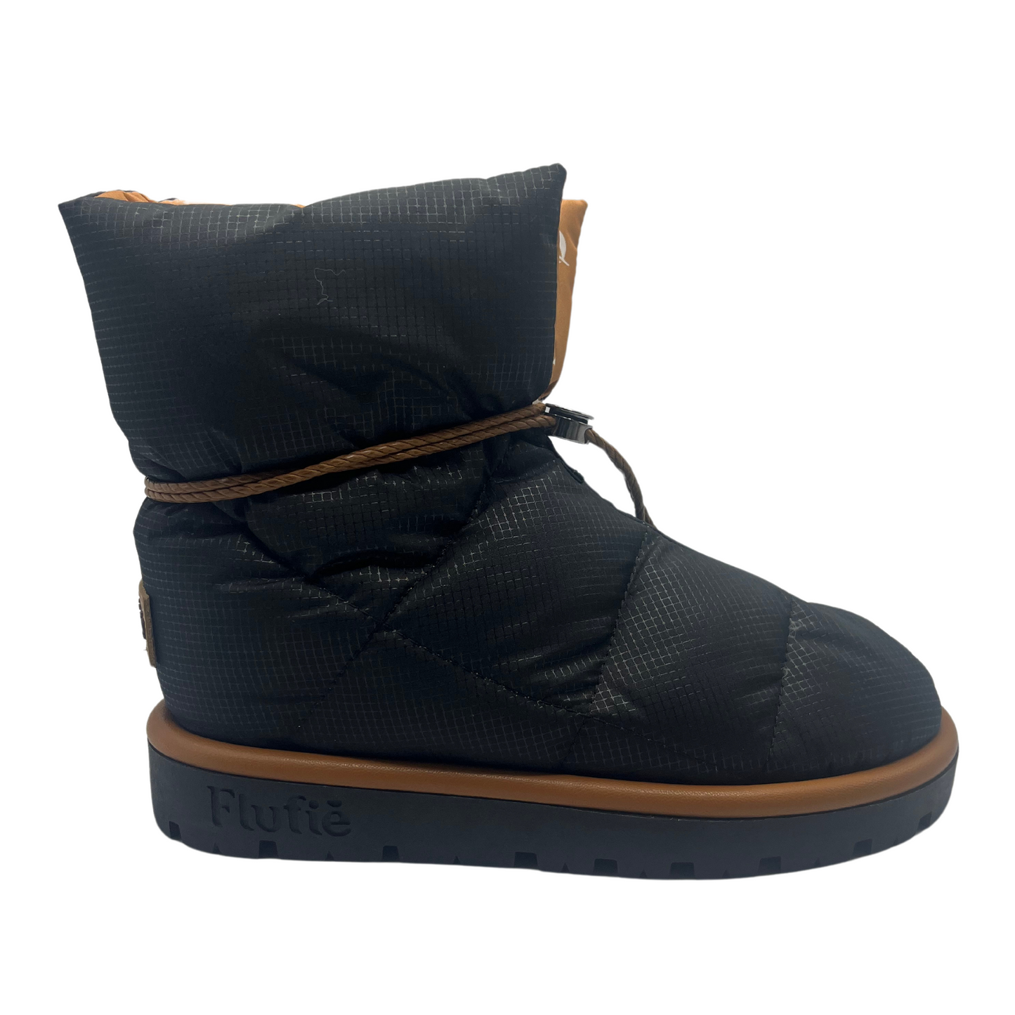 Right facing view of black puffer short boot with black and brown rubber outsole