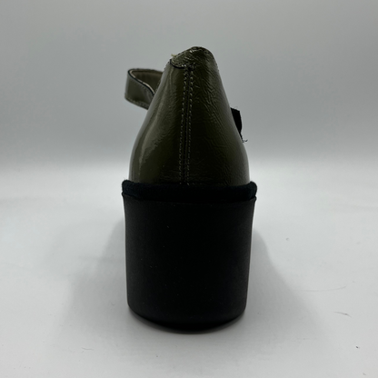 Black sandal with a thick sole on a white background