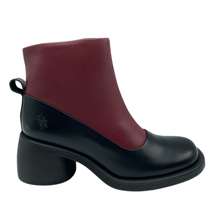 Right facing view of red and black short boot with chunky black heel