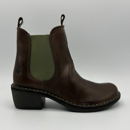 A dark brown leather Chelsea boot with an olive green elastic side panel and a low black block heel, shown from a side profile on a light gray background.