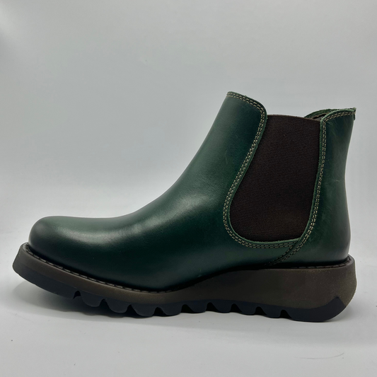 Green Chelsea boot on a white background