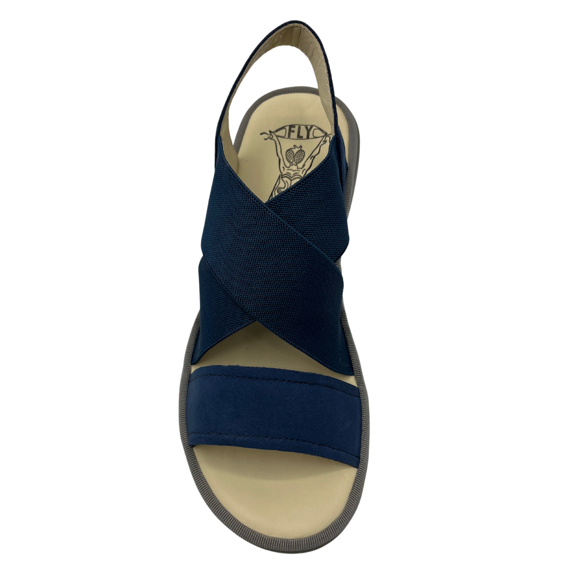 Top view of navy blue stretchy strapped sandal with lugged rubber outsole and rounded toe