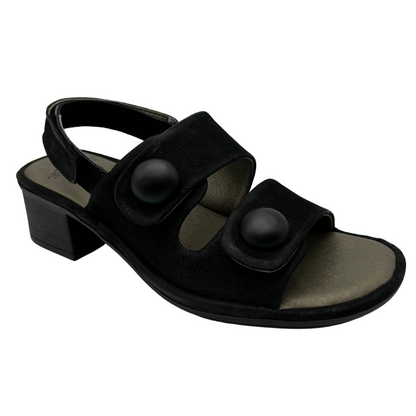 45 degree angled view of black leather sandal with block heel and double straps
