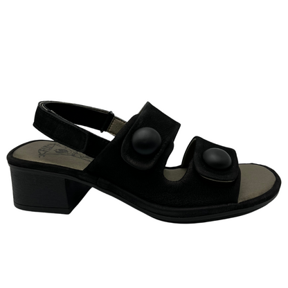 Right facing view of black leather sandal with block heel, velcro slingback strap and double straps with large buttons