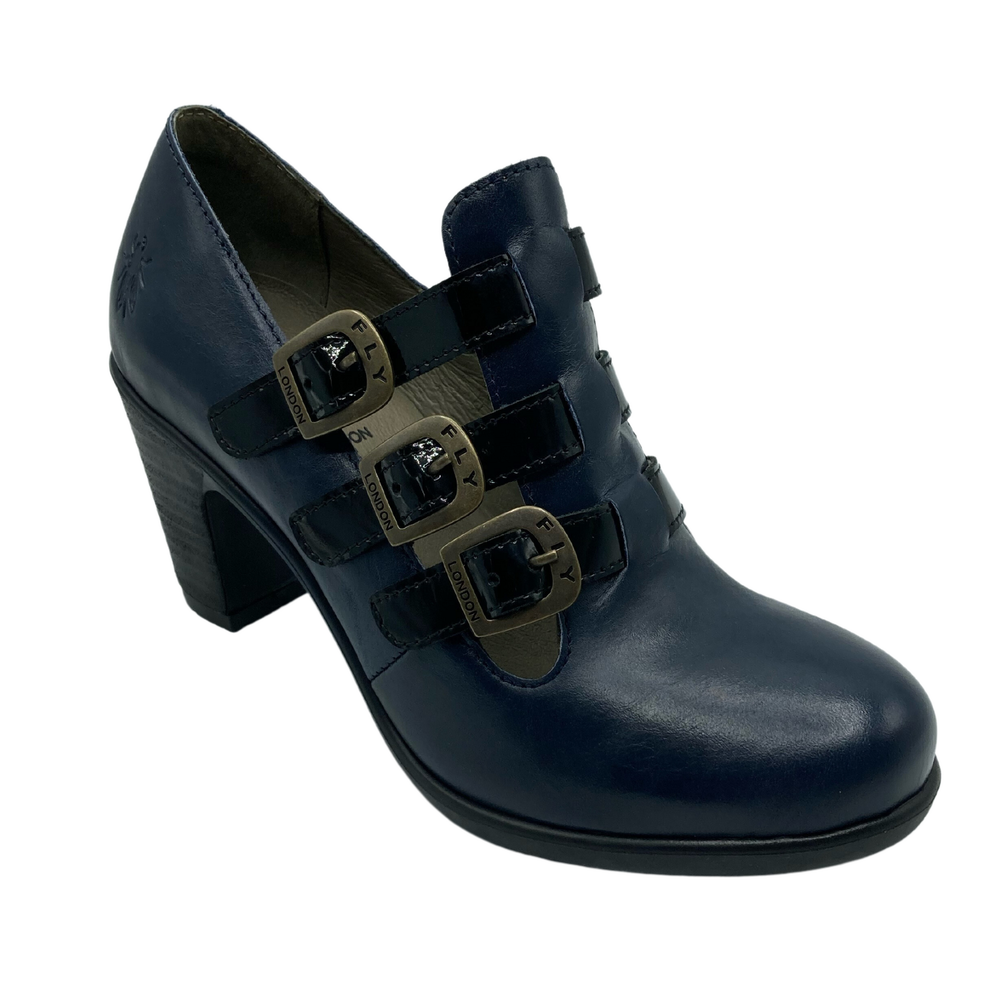 45 degree angled view of navy leather heels with 3 buckle detail and rounded toe
