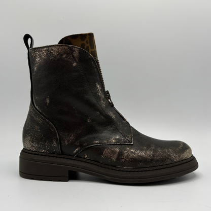 Right facing view of a weather look leather boot with a leopard print tongue