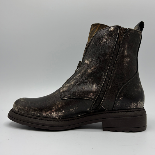 Left facing view of a weather look leather boot with a leopard print tongue