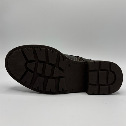 Bottom  view of a weather look leather boot with a leopard print tongue