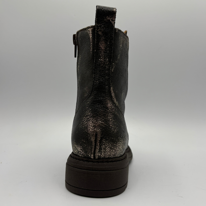 Back  view of a weather look leather boot with a leopard print tongue
