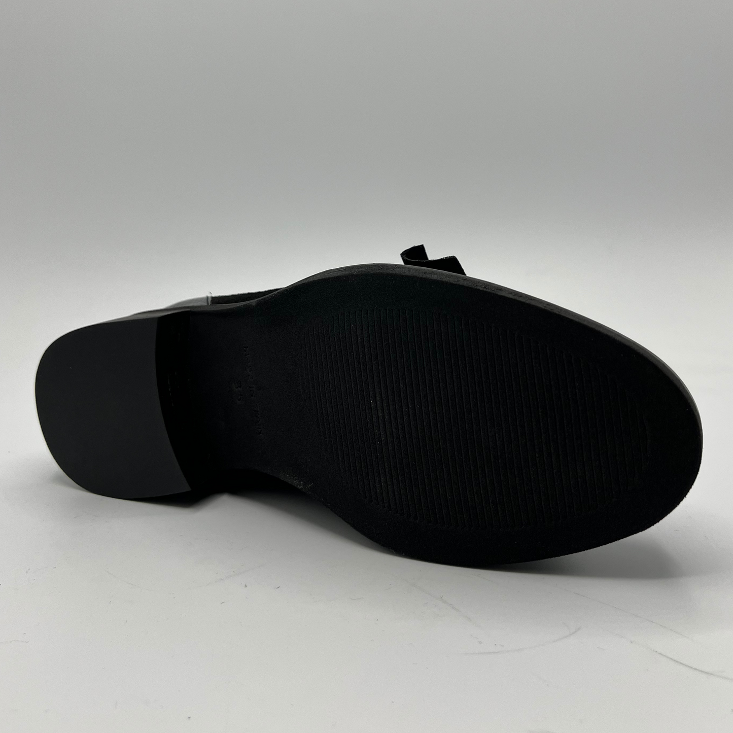 Black shoe sole on a white background
