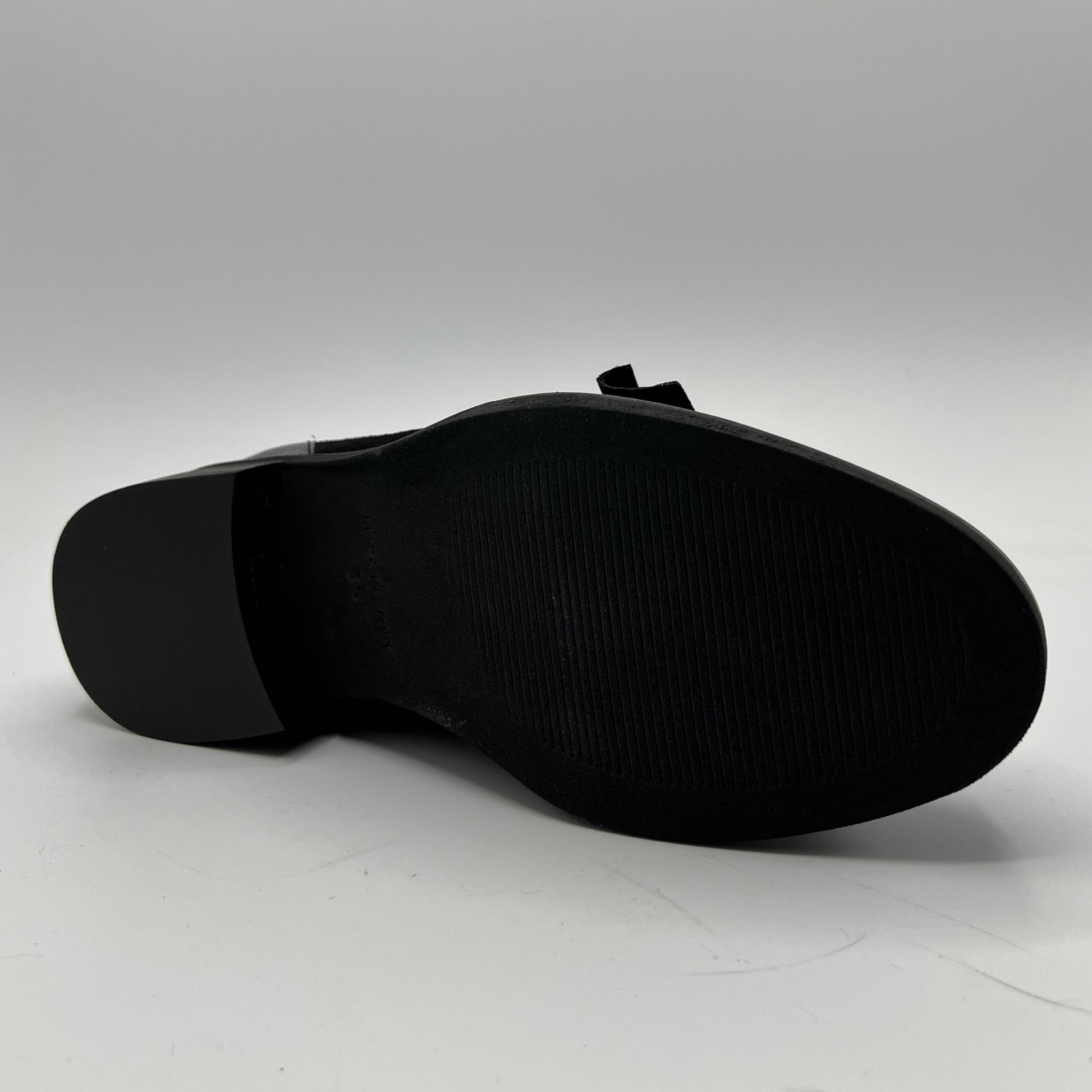 Black shoe sole on a white background