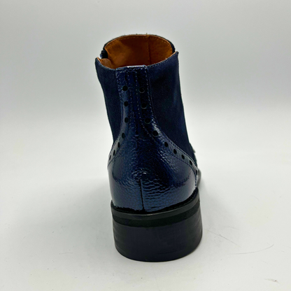 Blue leather boot on a white background