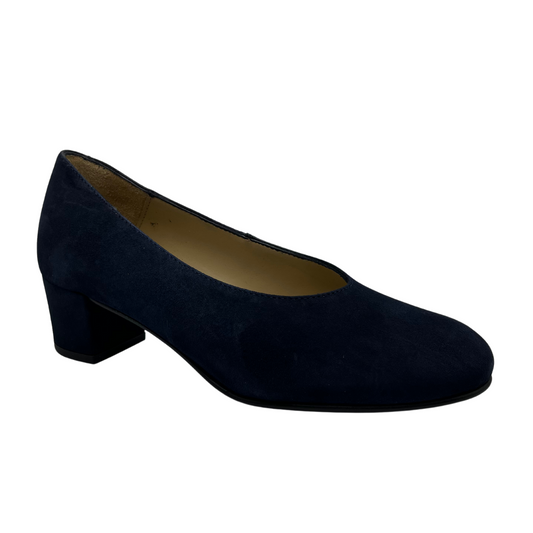 45 degree angled view of navy suede pump with a block heel and rounded toe