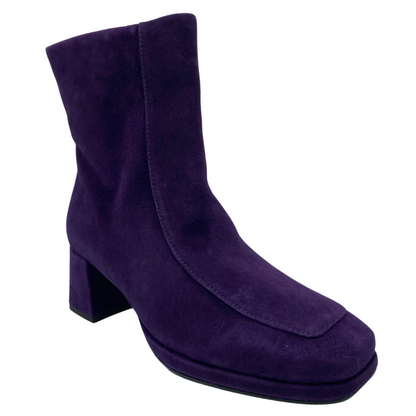 45 degree angled view of purple suede short boot with block heel and square toe