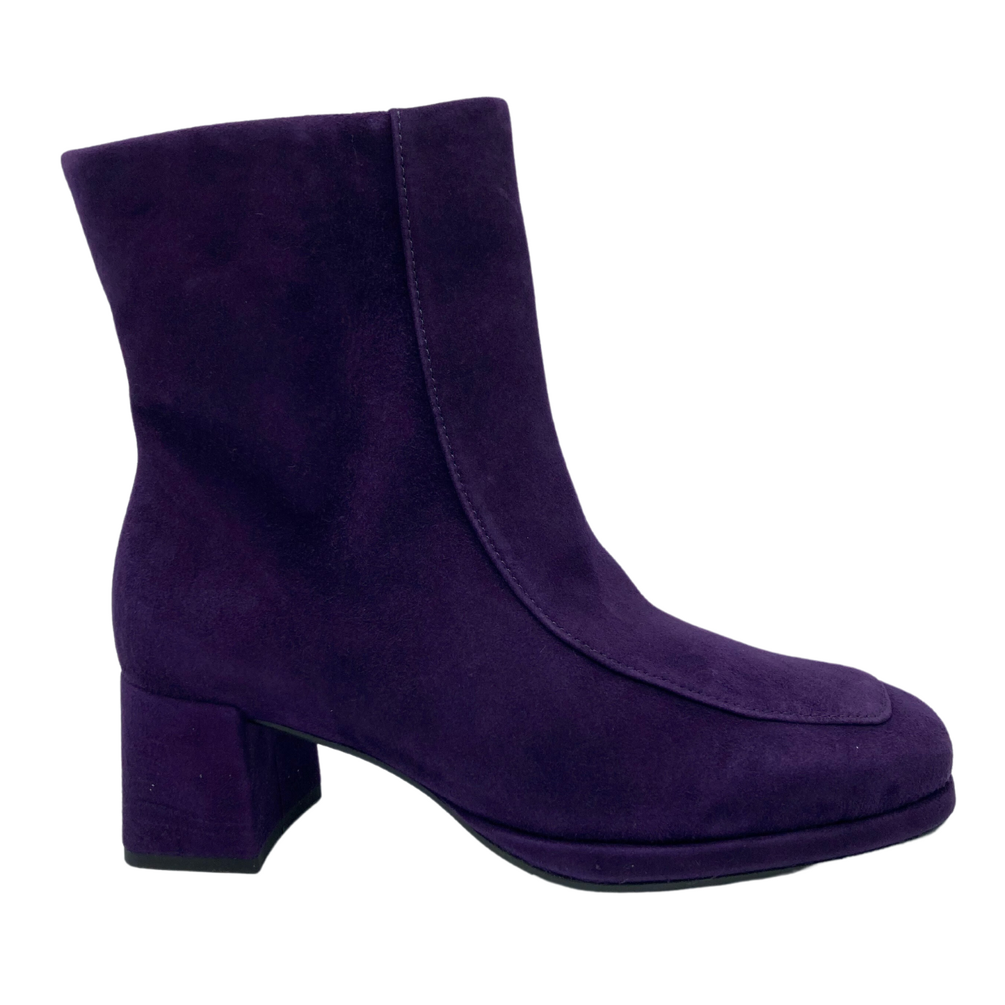 Right facing view of purple suede short boot with block heel and square toe