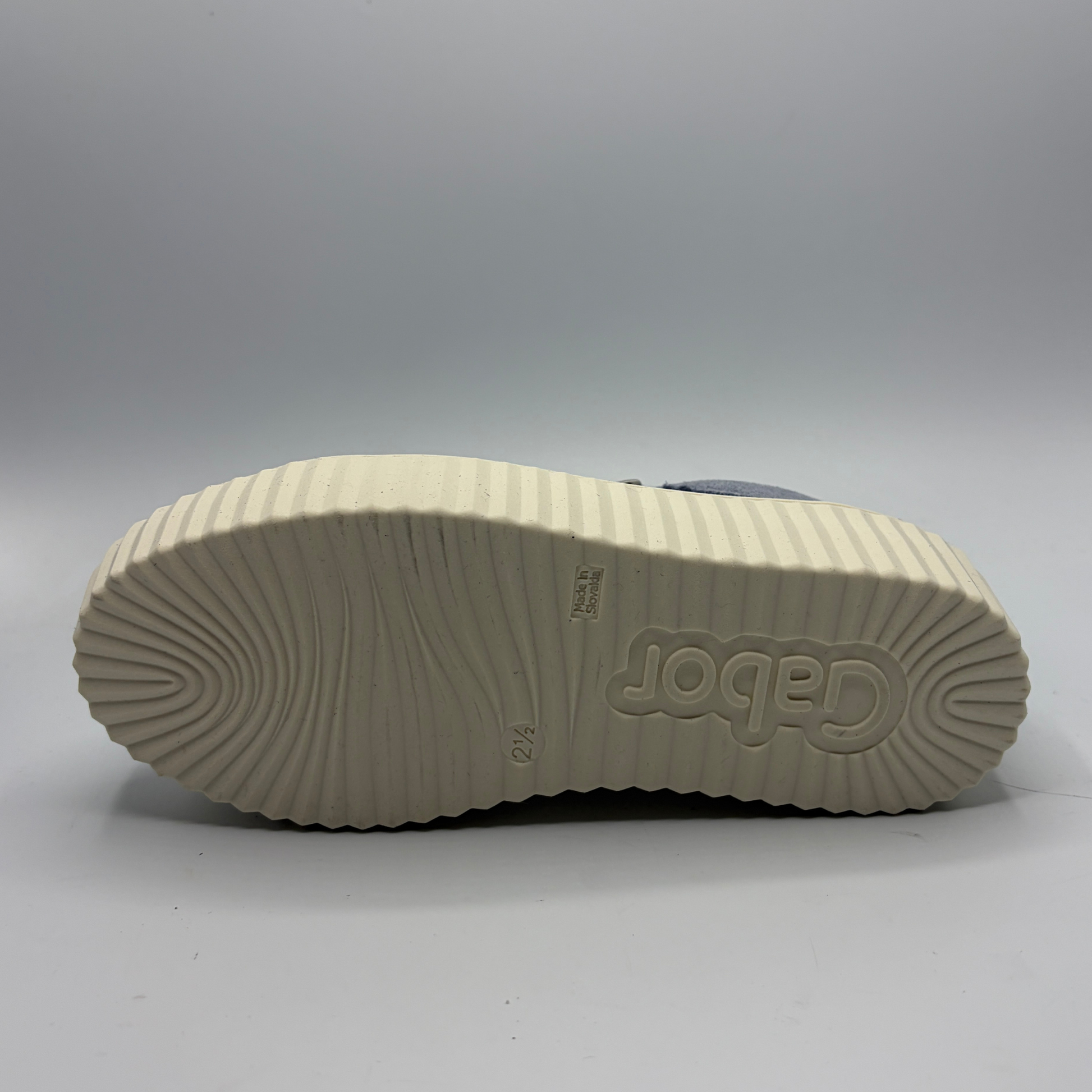 Sole of a shoe with 'Gabor' branding on a gray background