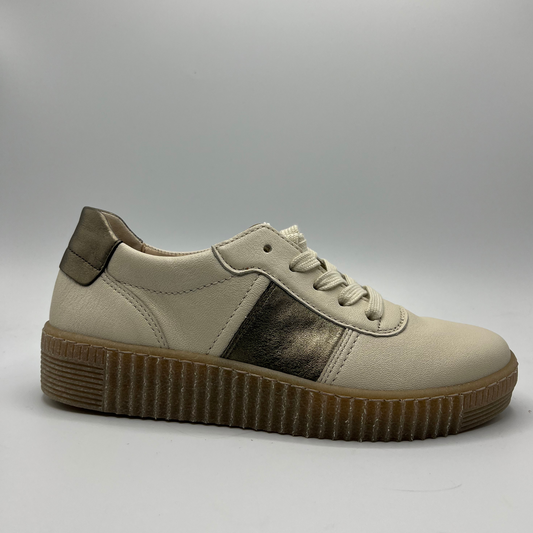Right facing view of a beige leather shoe with metallic accents and a lace up design