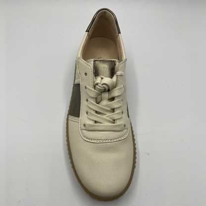 Top view of a beige leather shoe with metallic accents and a lace up design