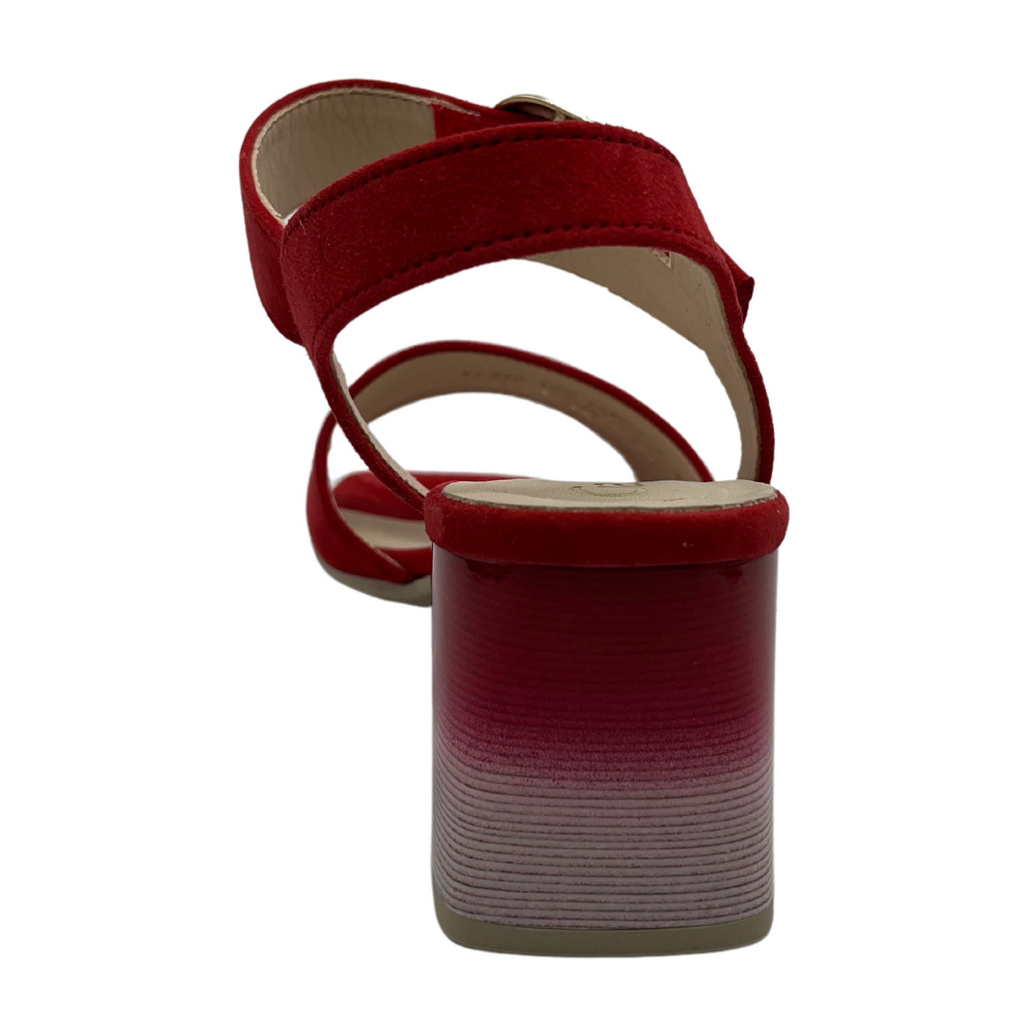 Back view of red high heeled sandal with soft square toe and silver buckle on the strap