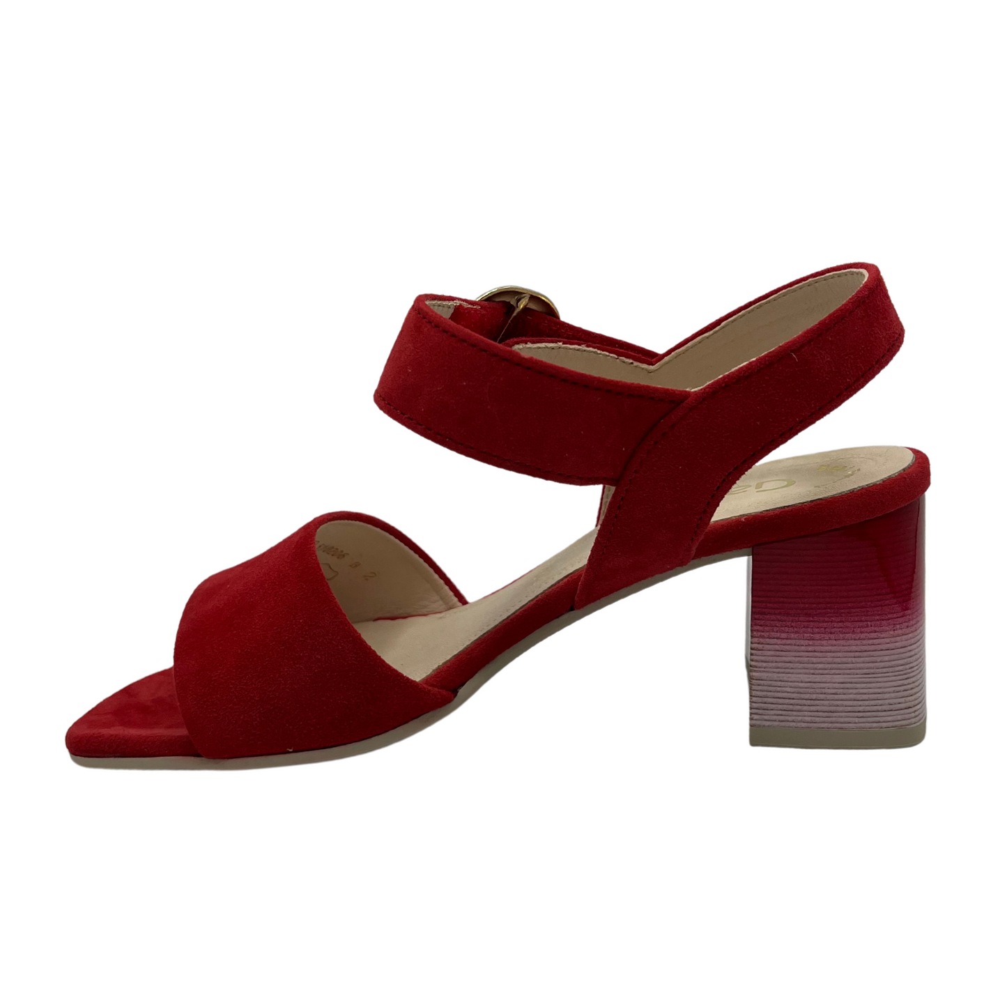 Left facing view of red high heeled sandal with soft square toe and silver buckle on the strap