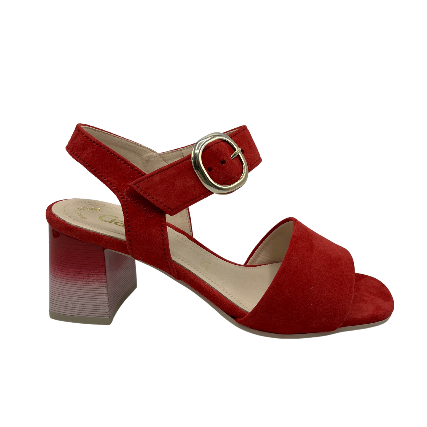 Right facing view of red high heeled sandal with soft square toe and silver buckle on the strap