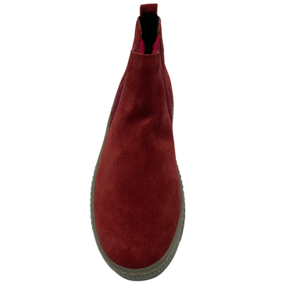 Top view of red rounded toe bootie with rubber sole