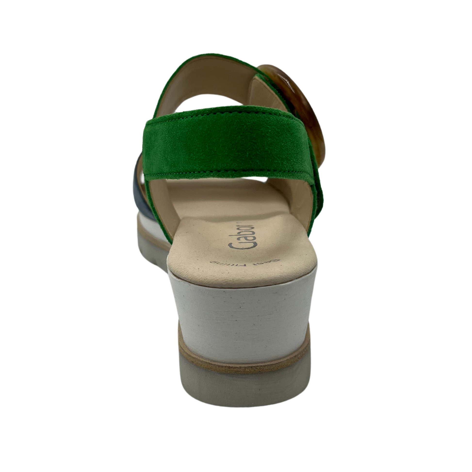 Back facing view of green and blue wedge sandal with buckle on top strap