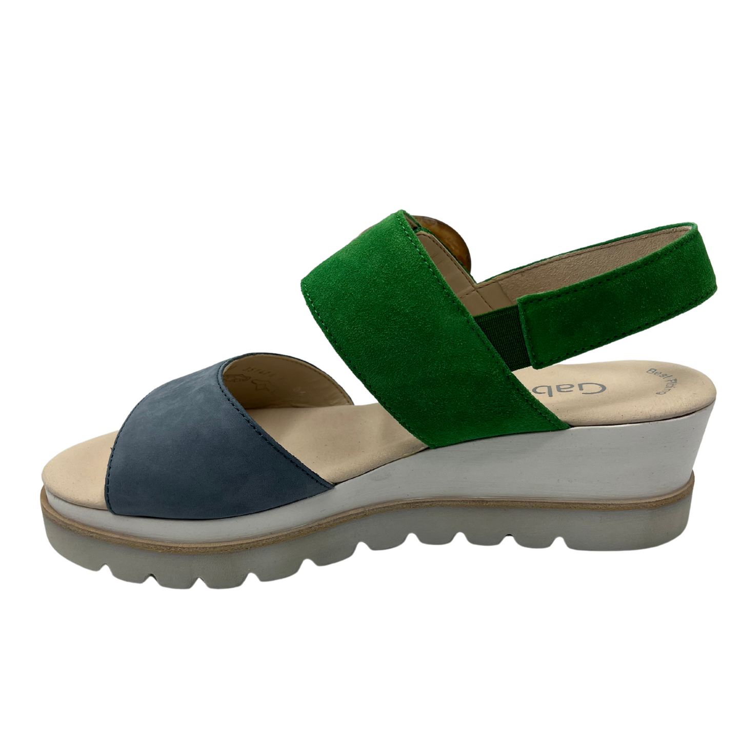 Left facing view of green and blue wedge sandal with sling back strap and open toe