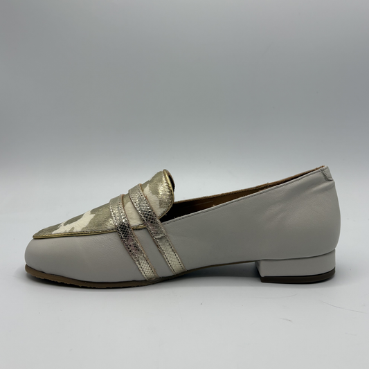 Left facing view of a beige loafer with buckle strap details