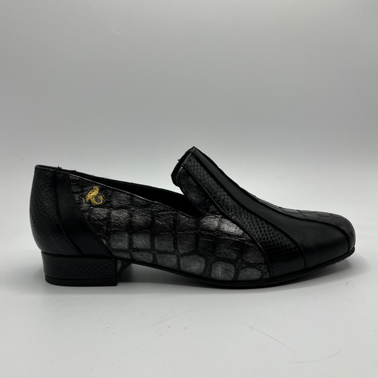 Black textured loafers on a light gray background