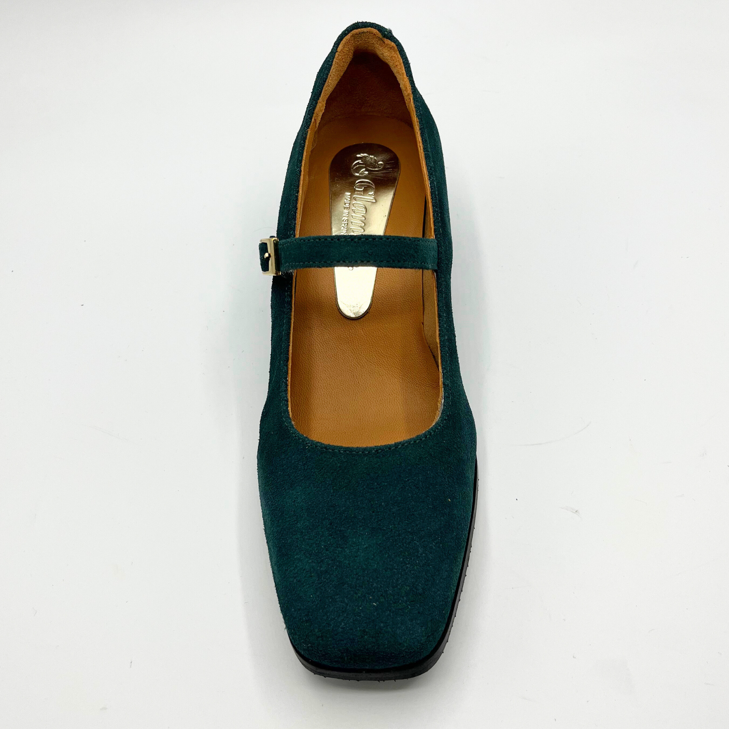 Top view of a deep green Maryjane heel shoe with a studded heel