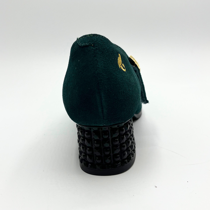 Back view of a deep green Maryjane heel shoe with a studded heel